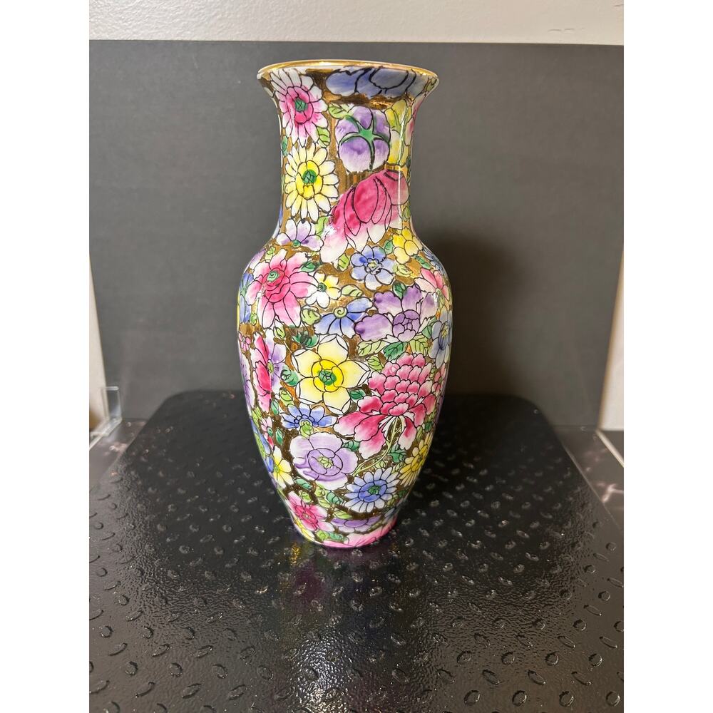 vintage Chinese porcelain vase featuring a hand-painted floral pattern